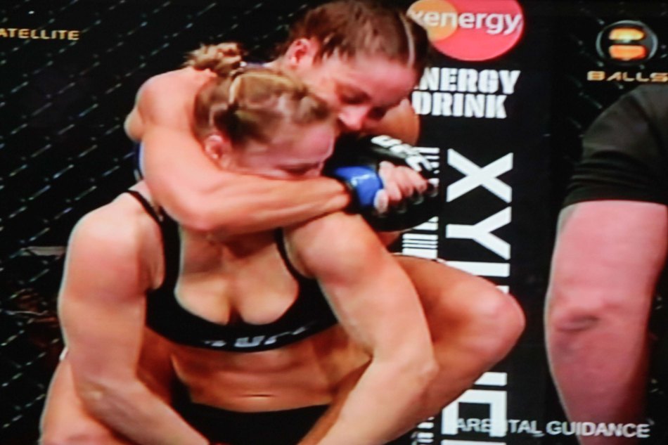 Carmouche had Rousey in trouble with a face crank. If she were able to put it under her chin it would be a rear naked choke. Uriah Faber was in the same position on Menjivar.