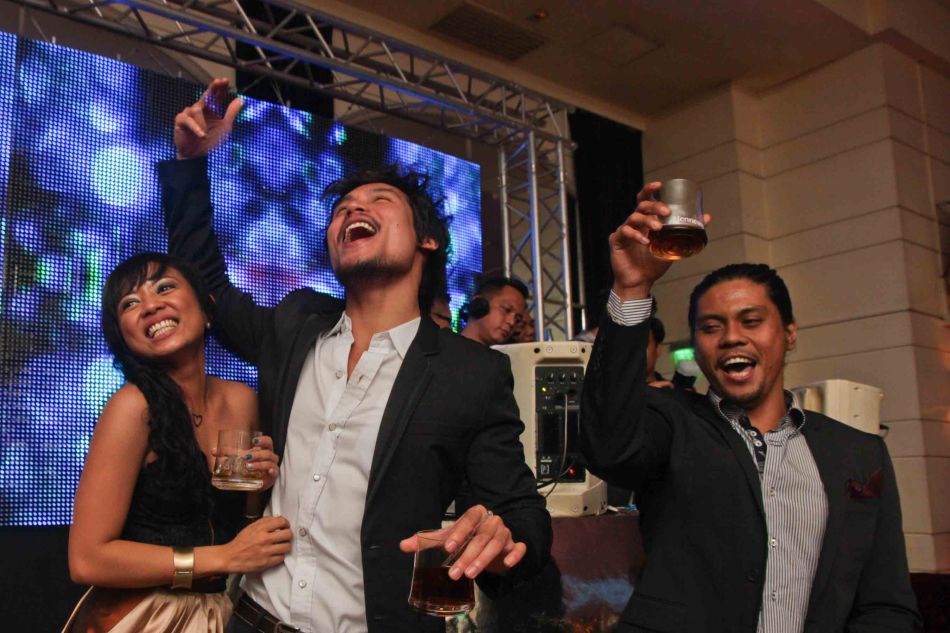 from left: Martha Comia, Jay Gonzaga and Jerald Napoles toast w Hennessy at the ILO ILO SLUMBER PARTY in OPUS last December 2, 2013. Catch the CANNES and Golden Horse award winning film ILO ILO in Philippine theaters NOW. Photo by Jude Bautista
